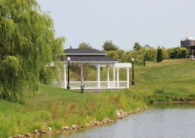 view of the Grand Gazebo with the pond in the foreground