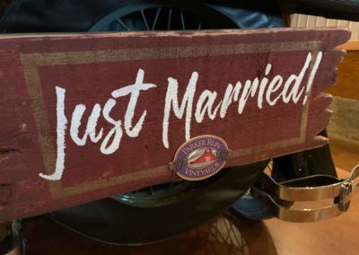 Just Married sign on back of Ford Model A in the Big Red Barn