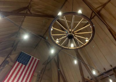 Wagon wheel chandelier in the Big Red Barn