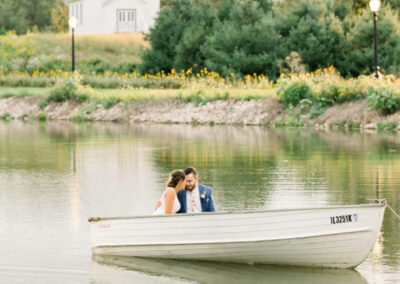 Couple on boat in pond at Parker Run Vineyards